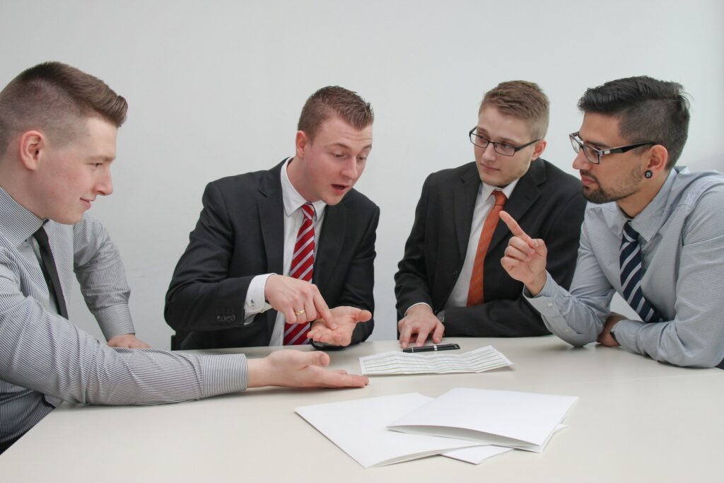 business policyholder discussing insurance claim with a public adjuster