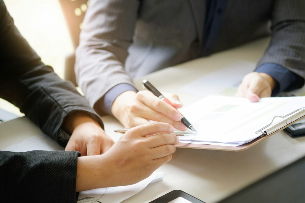 public adjuster examining pre-loss appraisal documents for a luxury home claim