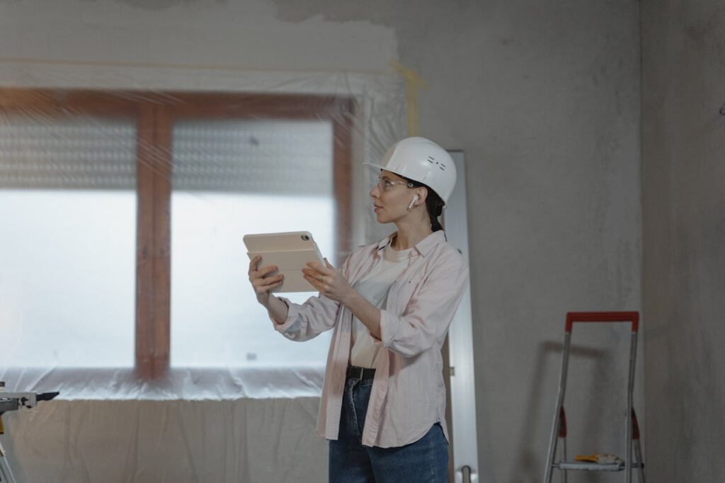 Structural engineer assessing property damage for insurance claim report
