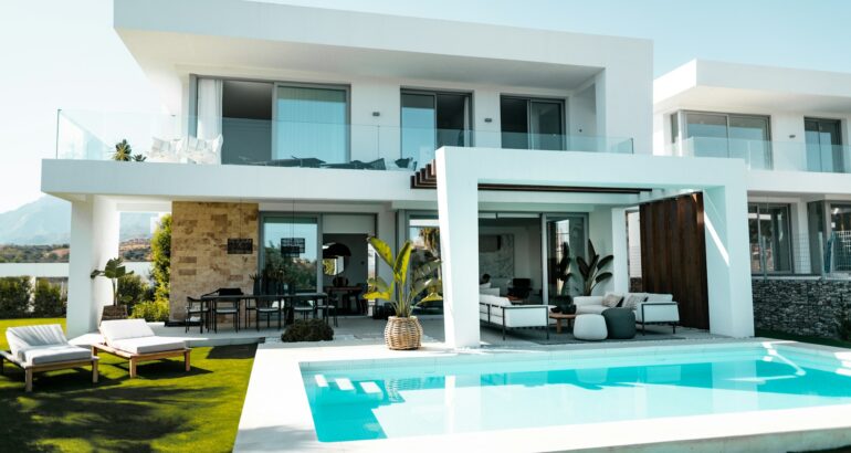 Luxury property with architectural plans highlighting valuation needs
