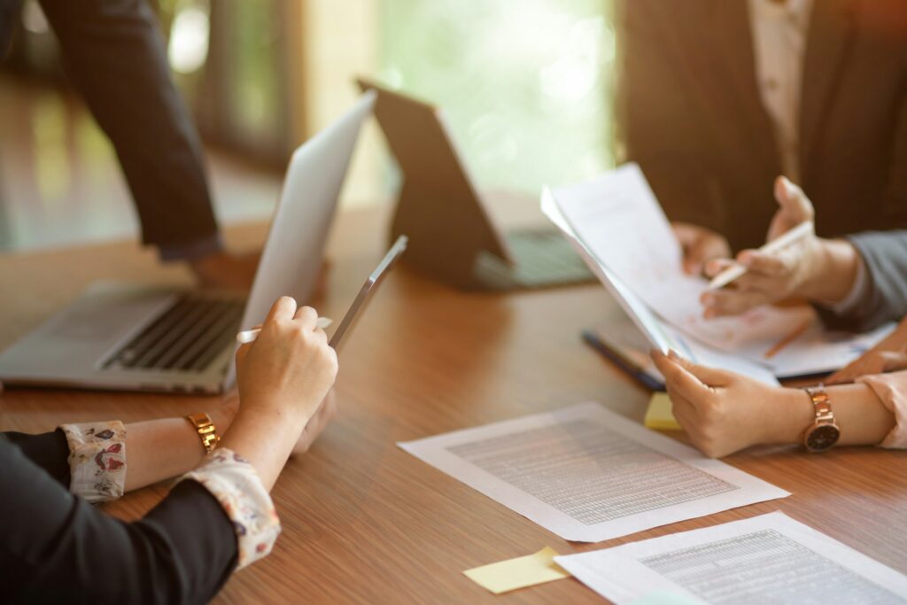 Public adjuster reviewing policyholder’s claims diary for insurance negotiation