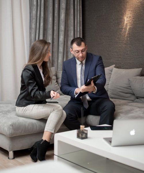 Public adjuster reviewing claim details with a client during a consultation